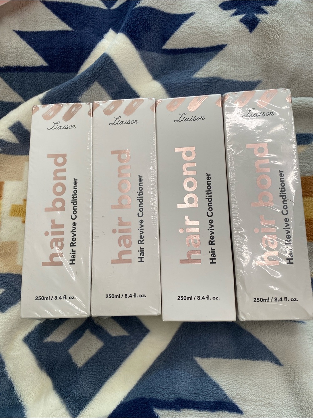 4 pack Liaison Hair Bond Hair Revive Conditioner — Pink and White